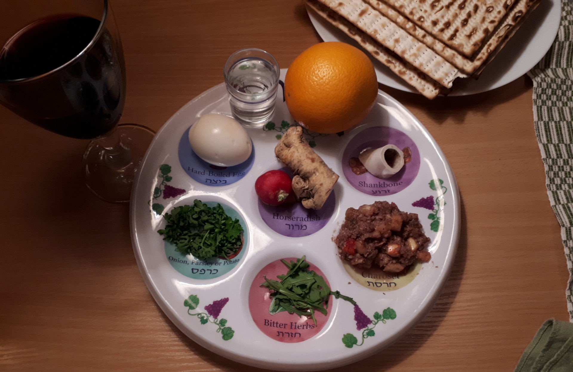 Passover_Seder_plate_with_wine_and_matzot