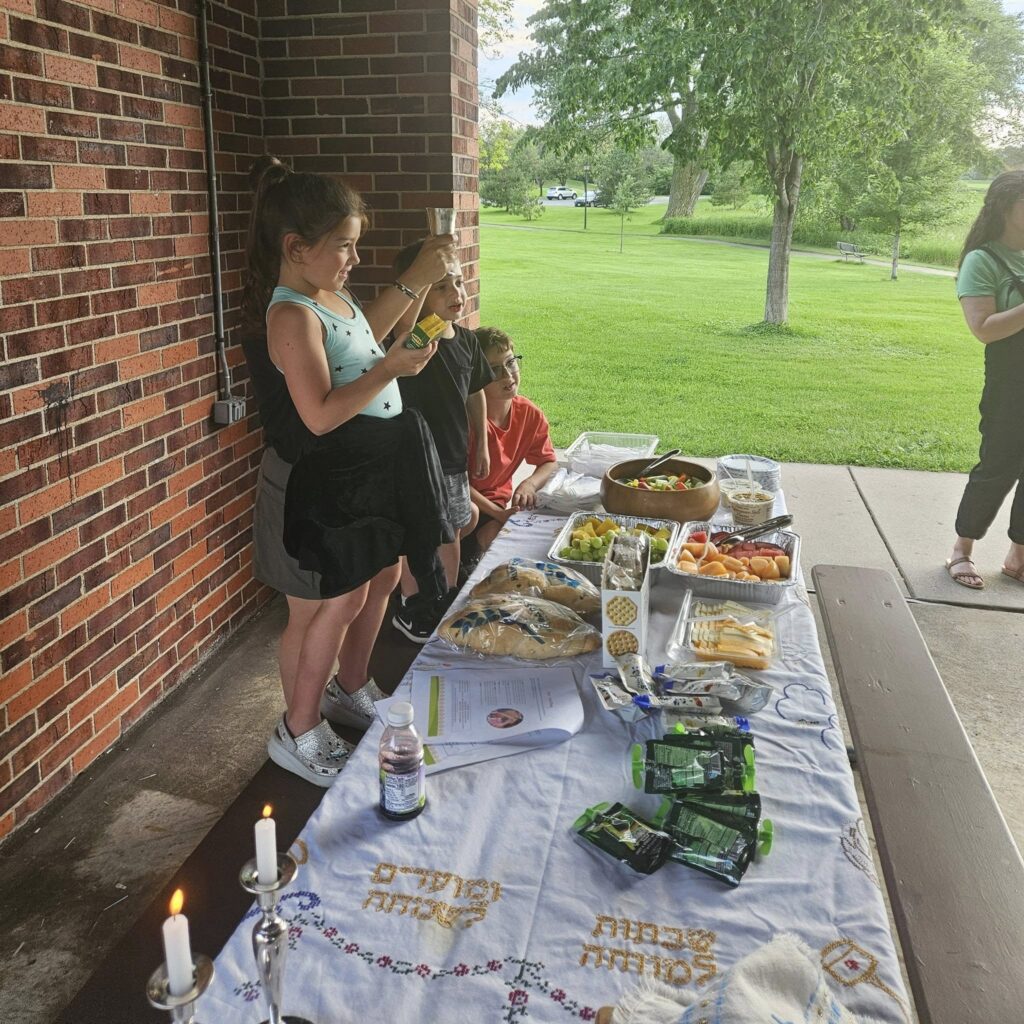  Photo from a 2024 Shabbat in the Park hosted by our sister site, TC Jewfolk in the Twin Cities. Come join us and meet your friends and neighbors at Shabbat in the Park this summer!