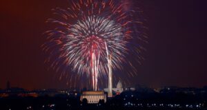 Fireworks going off over the Lincoln memorial and US capital building